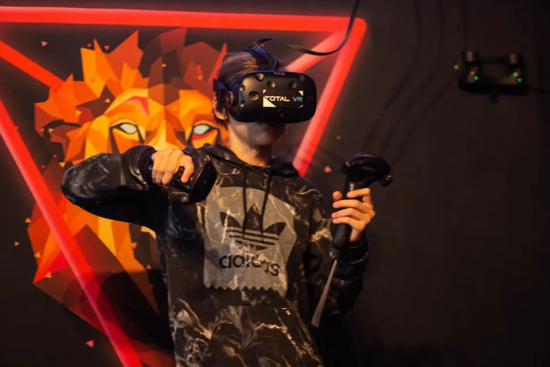Guest playing an action VR game at Total VR